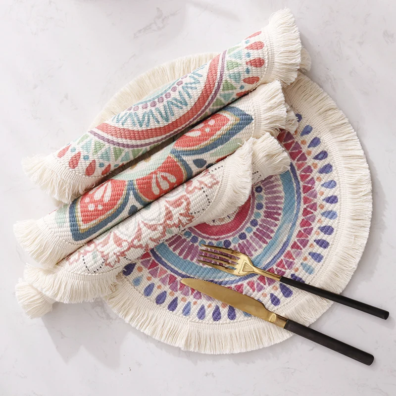 Round flat-woven cotton rug with mandala design and decorative fringes Stornfield