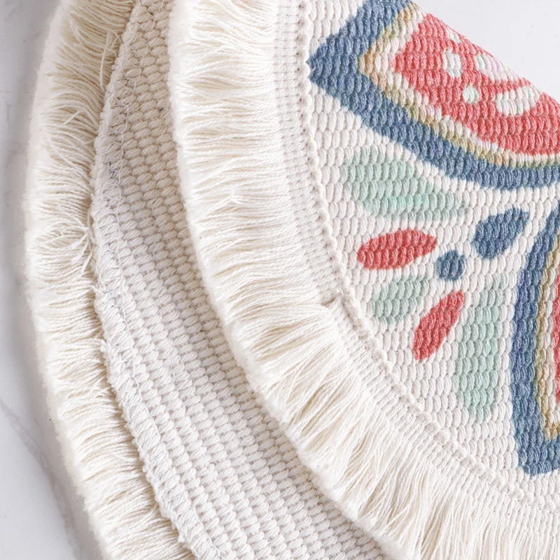 Round flat-woven cotton rug with mandala design and decorative fringes Stornfield