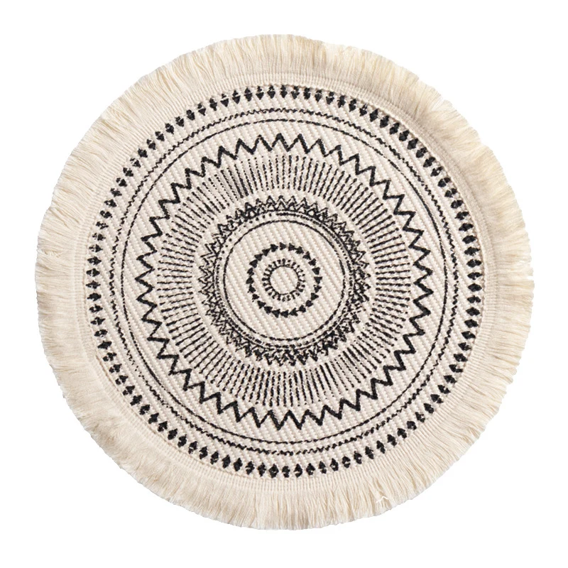 Round woven Boho rug mat with decorative fringes Stornfield