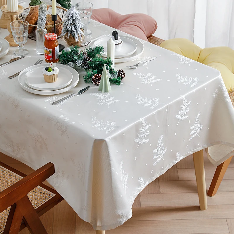 Rectangular premium table linen made of jacquard polyester with subtle frost floral embossing Stornfield