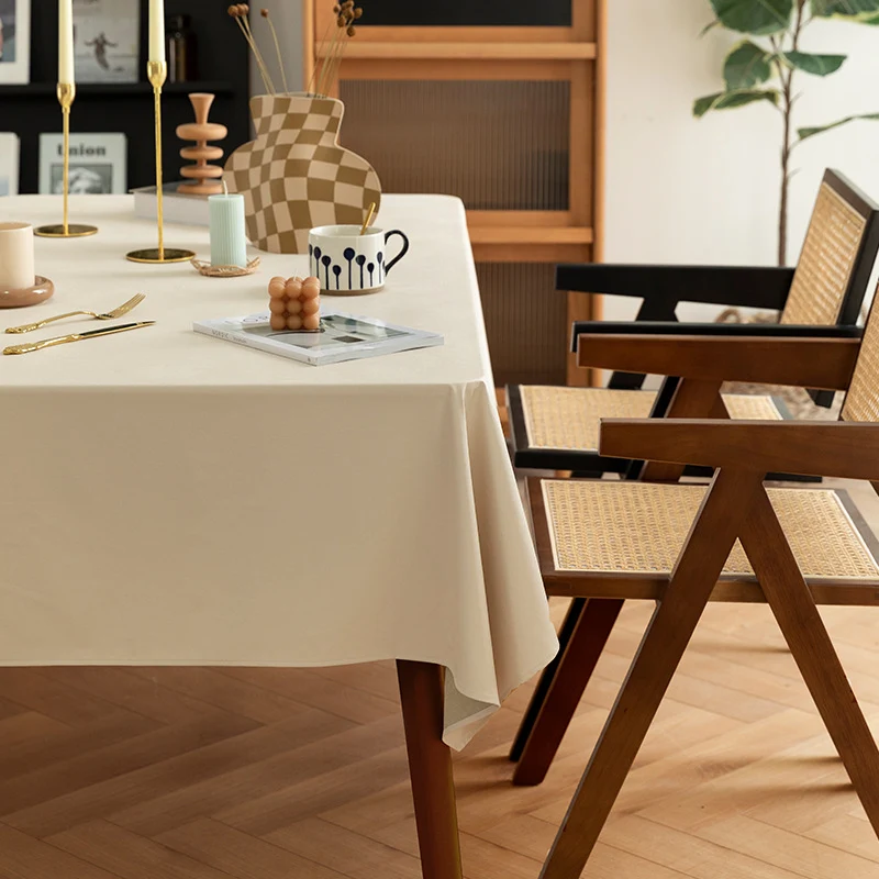 Rectangular easy-care tablecloth made of cotton blend with water-repellent coating and fine texture Stornfield