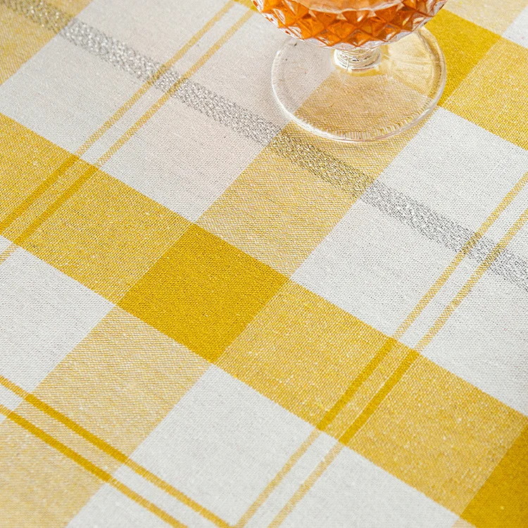 Rectangular checked cotton tablecloth with decorative fringes and light linen finish Stornfield