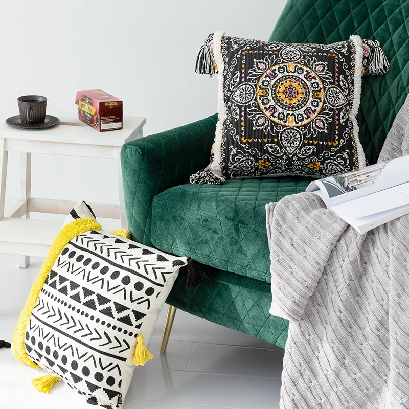 Square cushion cover with 3D alpaca appliqué, bouclé patch and pom-pom corners Stornfield