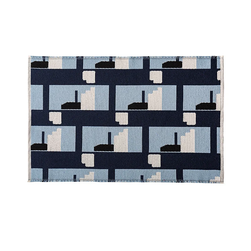 Modern geometric bathroom rug made of flat-woven cotton with non-slip backing Stornfield