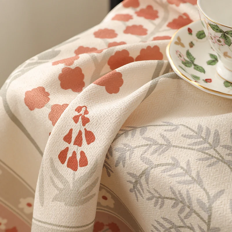 Rectangular easy-care tablecloth in floral jacquard with decorative border Stornfield