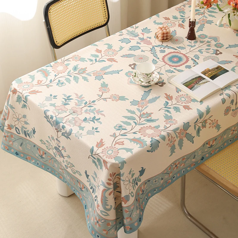 Rectangular easy-care tablecloth in floral jacquard with decorative border Stornfield