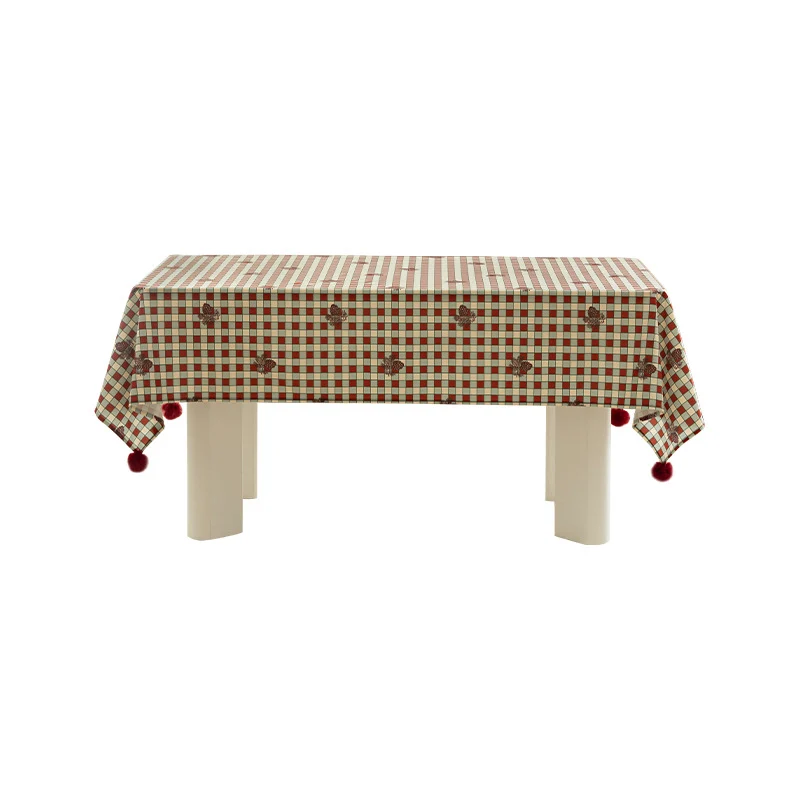 Rectangular decorative tablecloth with checkered pattern, pompom trim, and fine embroidered applique Stornfield