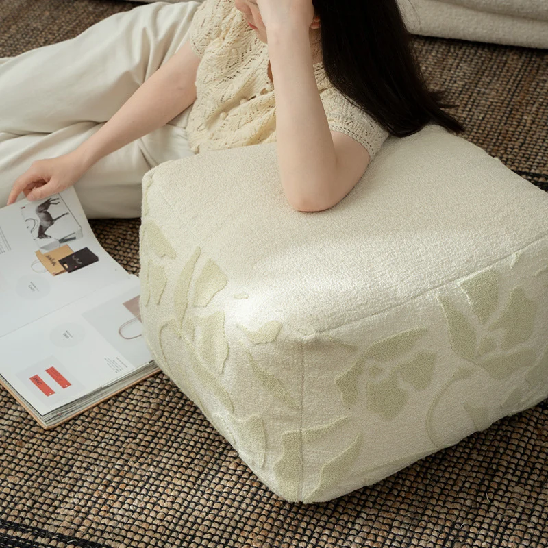 square pouf with bouclé cover and textured jacquard pattern Stornfield