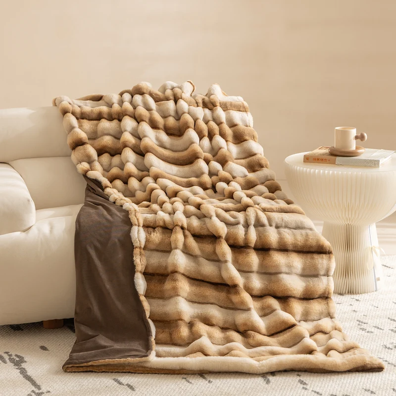 Luxurious cozy faux fur blanket with quilted relief pattern Stornfield