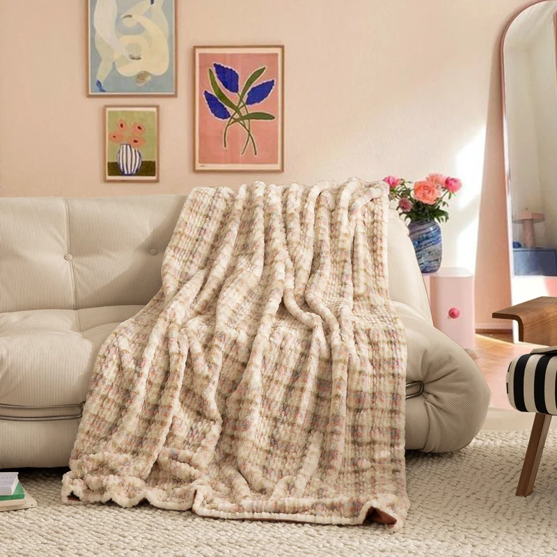 Cozy blanket made of luxurious synthetic fur with wavy texture and soft microfiber back Stornfield