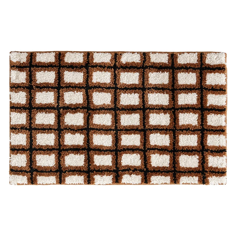 Short pile bath mat with geometric check pattern and non-slip backing Stornfield