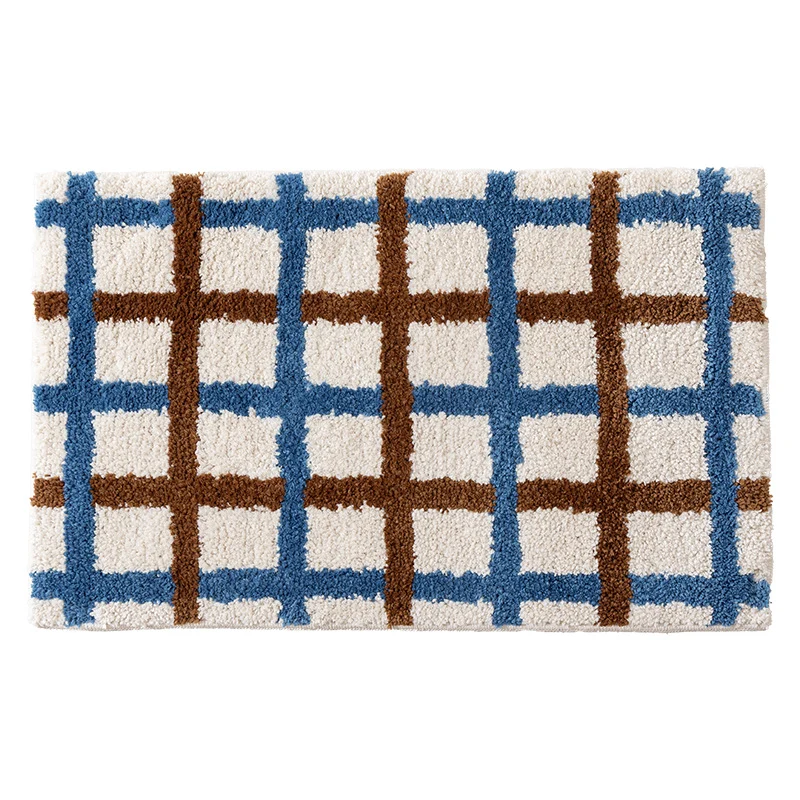 Short pile bath mat with geometric check pattern and non-slip backing Stornfield