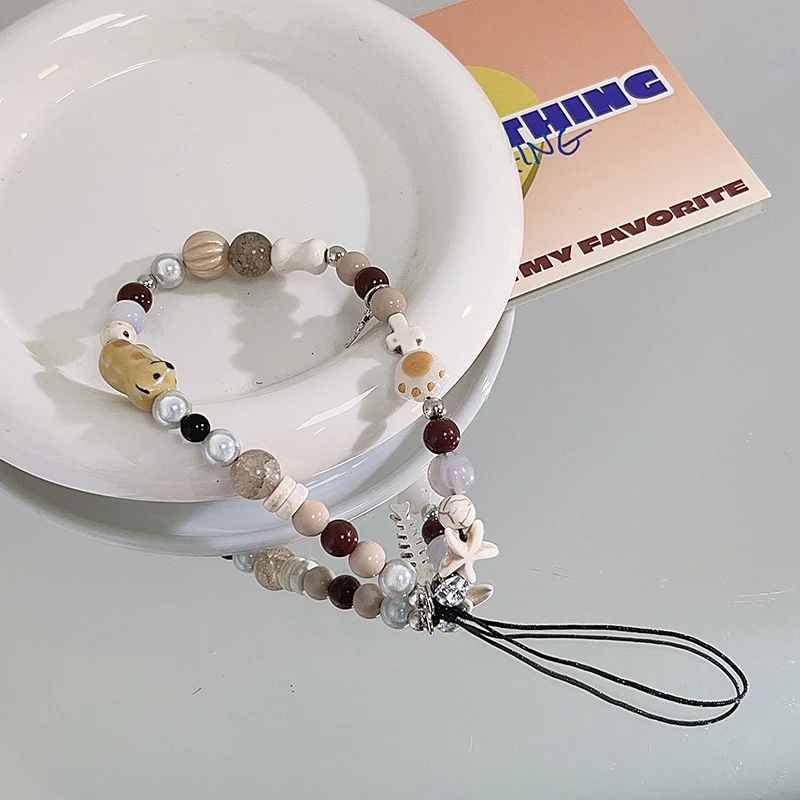 Animal-Themed Beaded Charm Eyewear Holder Stornfield