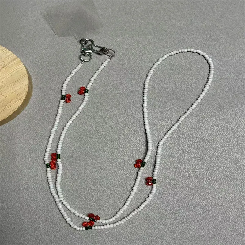 Perlen-Brillenband mit künstlerischen Charms Karnz