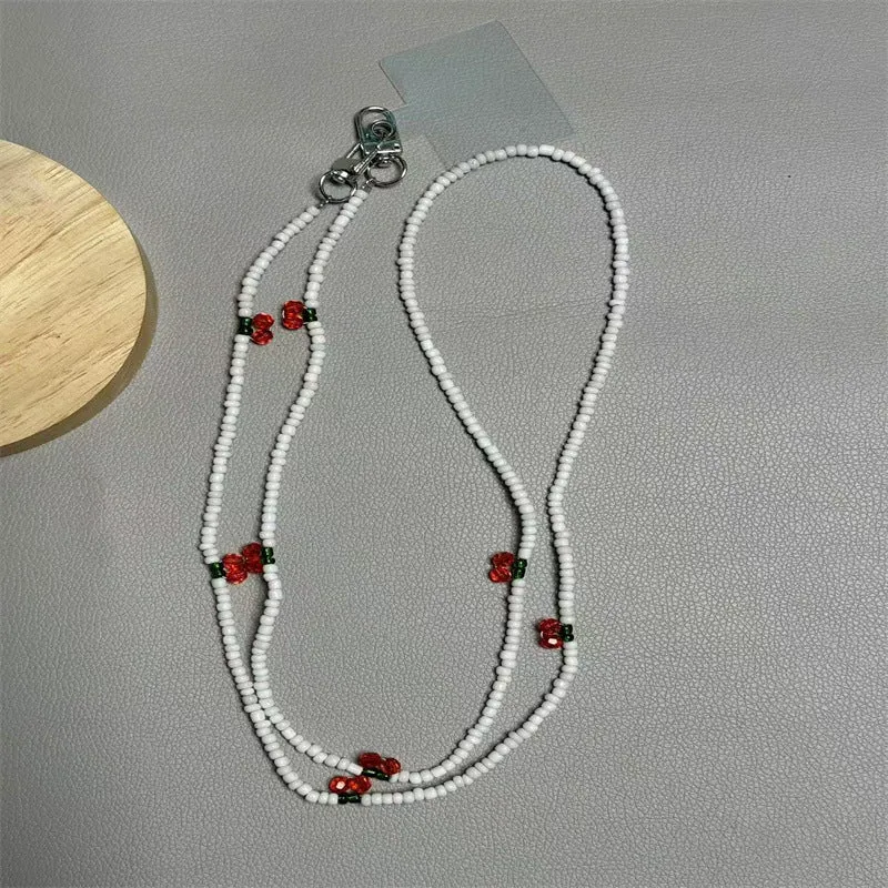 Perlen-Brillenband mit künstlerischen Charms Karnz