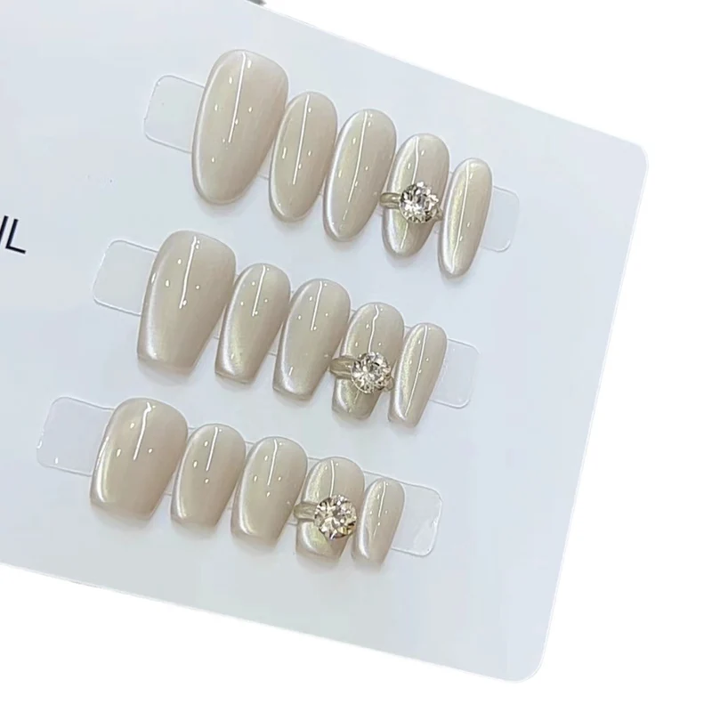 Elegant Press-On Nail Art with Jewel Accents Stornfield