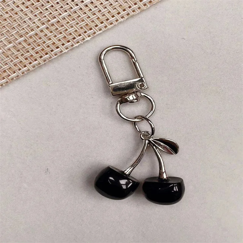 Kirschenförmiger Charm Schlüsselanhänger Karnz