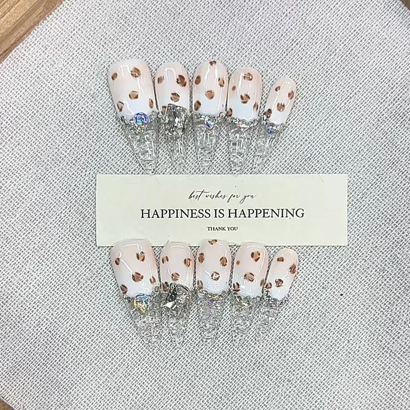 Press-On Nail Art with Glitter and Gem Accents Stornfield
