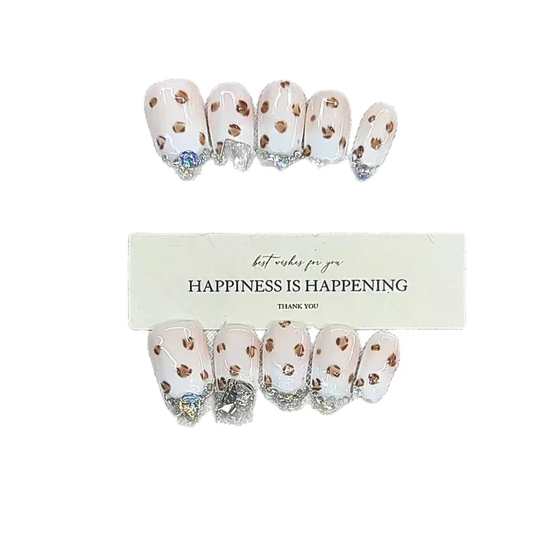 Press-On Nail Art with Glitter and Gem Accents Stornfield