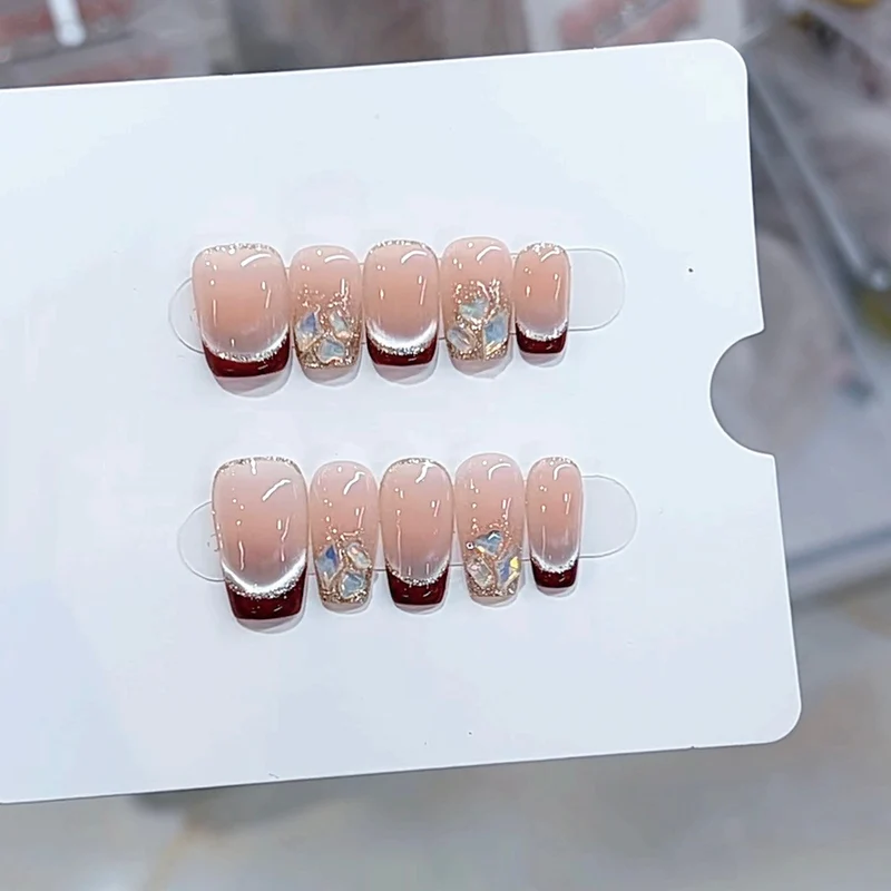 Elegant French Tip Design Press-On Nails with Glitter and Decorative Accents Stornfield
