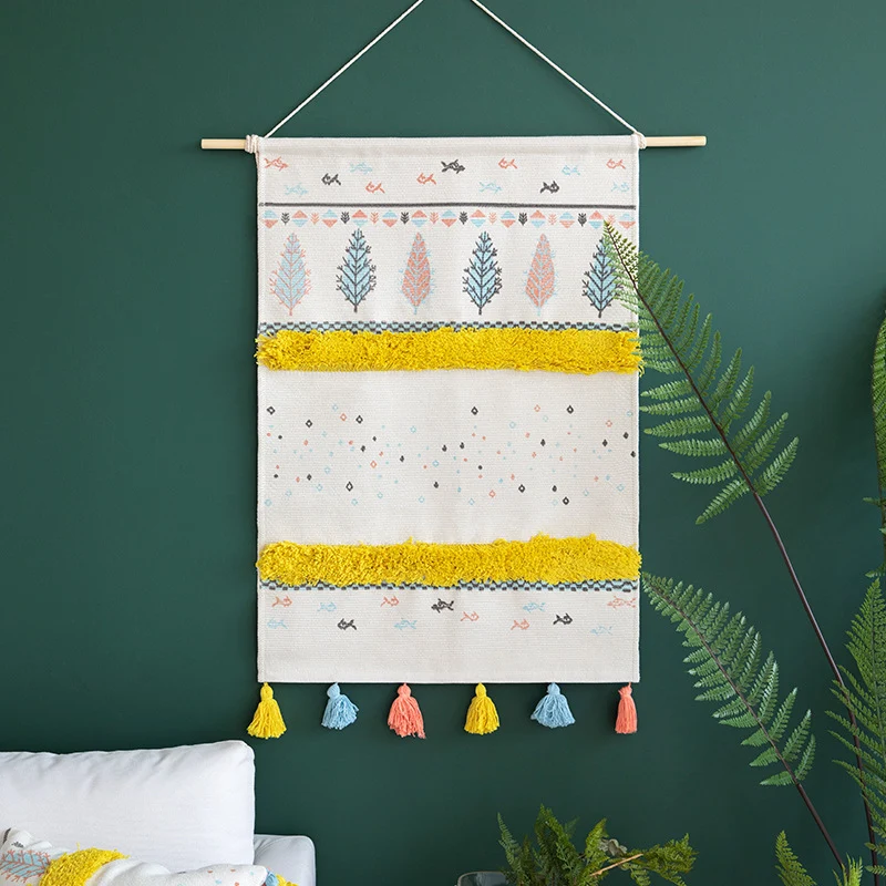 Wall tapestry in Scandi-Boho style with tufting stripes, tassels, and wooden rod Stornfield