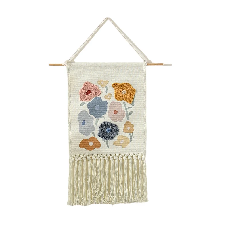 Woven cotton wall hanging with punch needle flower relief and fringes Stornfield