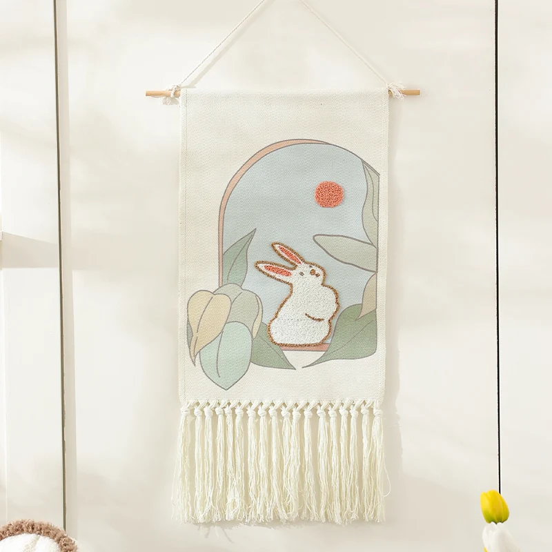 Woven cotton wall hanging with punch needle flower relief and fringes Stornfield