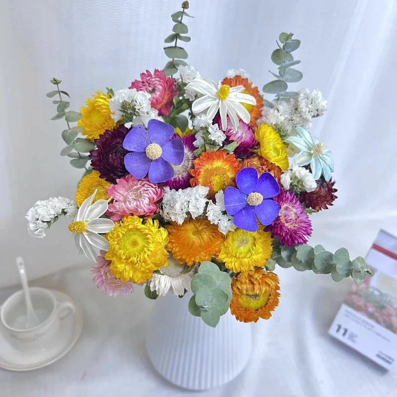 Getrocknete Blumen Baumwollanordnung