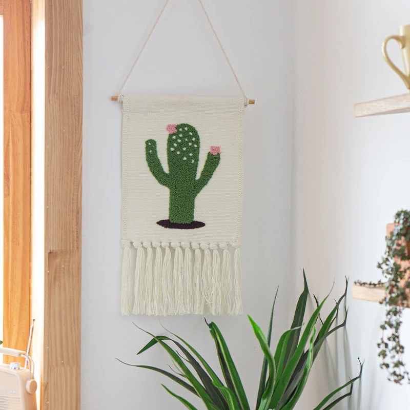Woven cotton blend wall hanging with tufted cactus motif and cotton fringes Stornfield