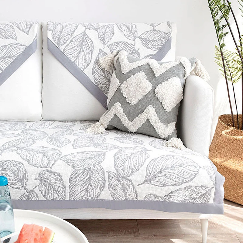 Universal sofa protective cover for three-seater with leaf print, non-slip underside and separate armrest covers Stornfield