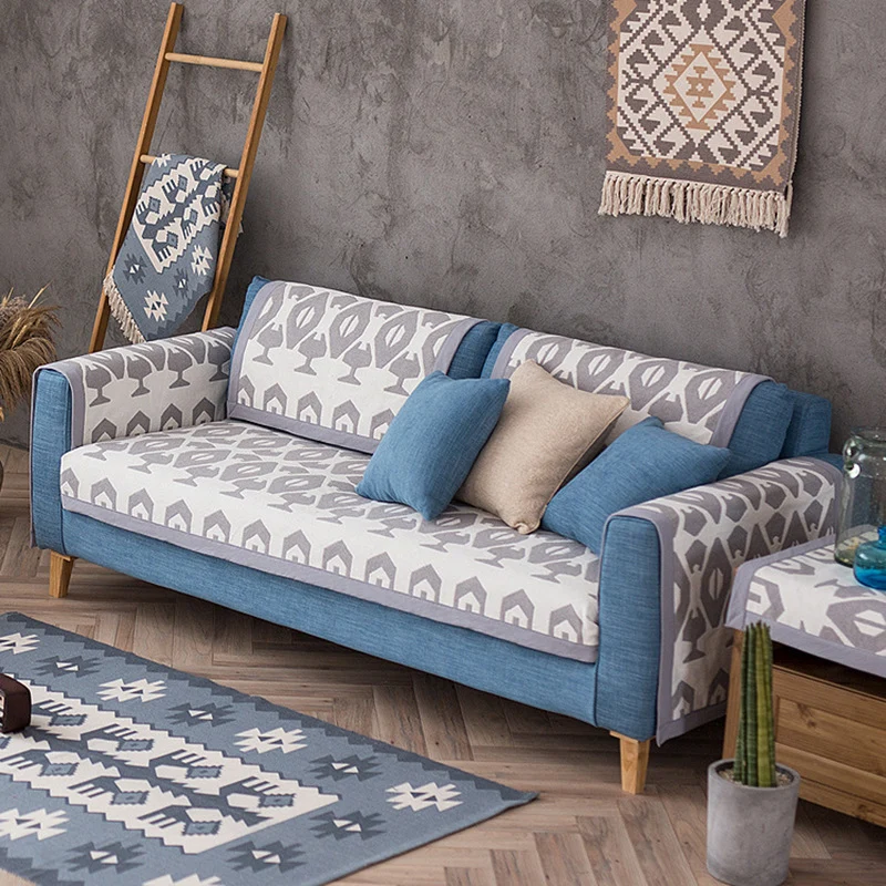 Universal sofa protective cover for three-seater with leaf print, non-slip underside and separate armrest covers Stornfield