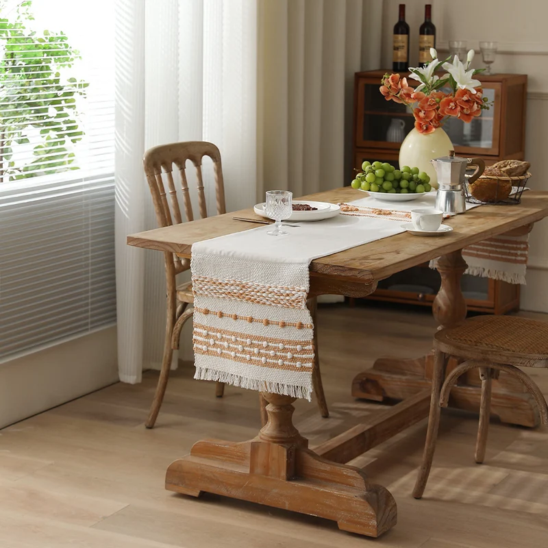 Woven cotton table runner with fringes and textured pattern Stornfield