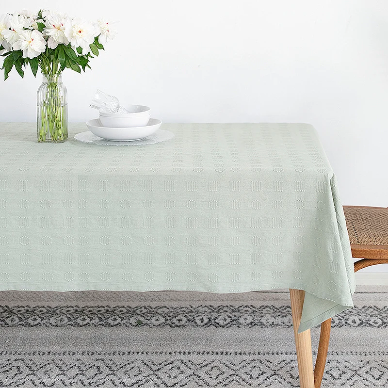 Tablecloth made of cotton blend with embossed square and circle relief Stornfield