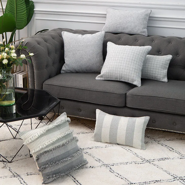 Structured decorative cushion cover with layered fringes and two-tone woven pattern Stornfield