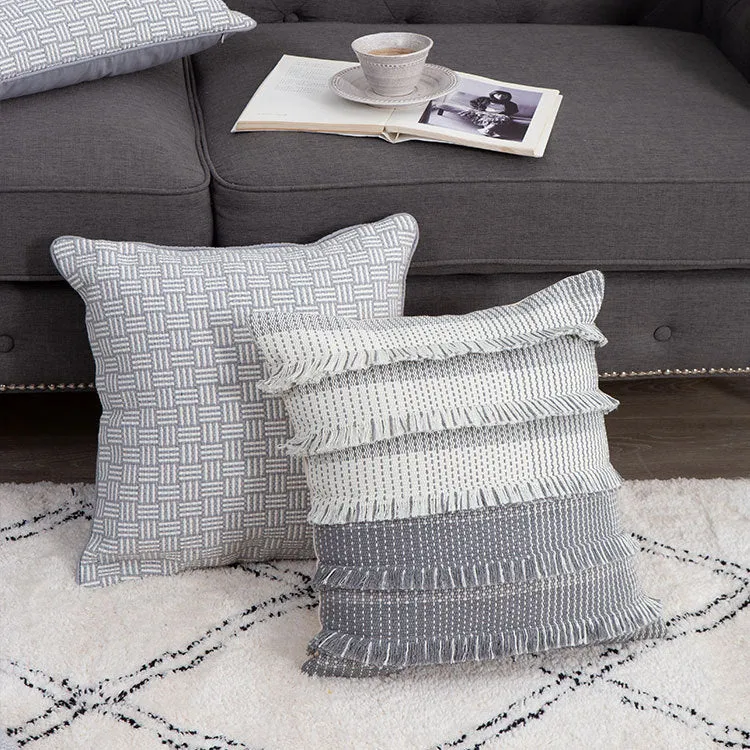 Structured decorative cushion cover with layered fringes and two-tone woven pattern Stornfield
