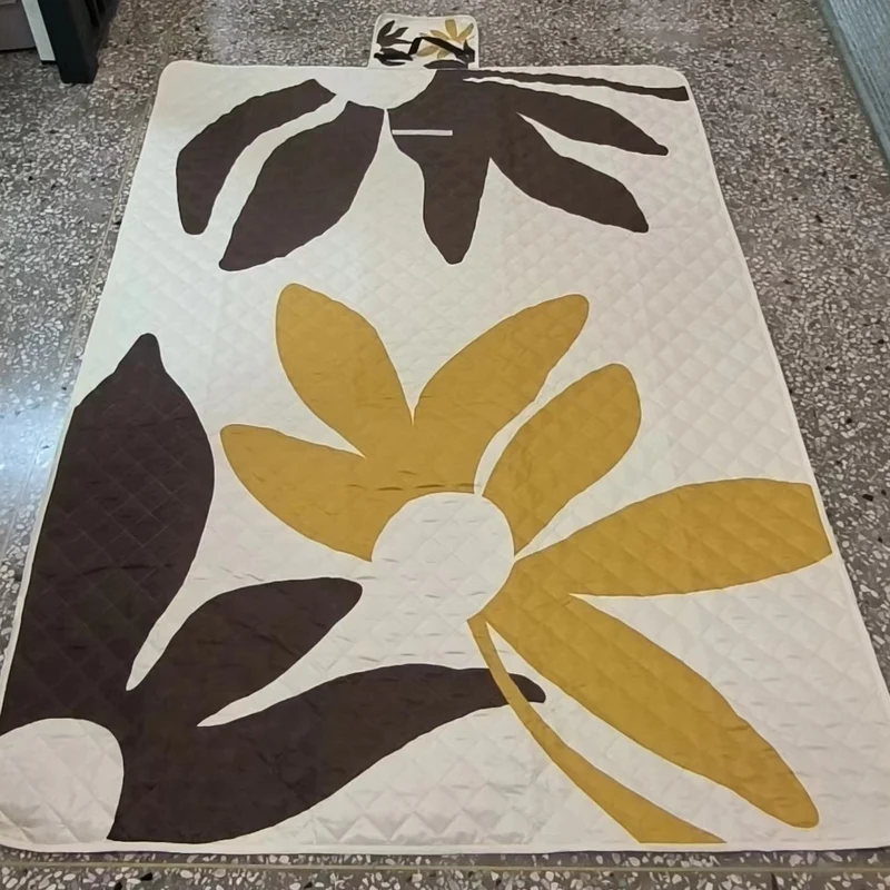 Quilted bedspread with large floral appliqué and diamond quilted relief Stornfield