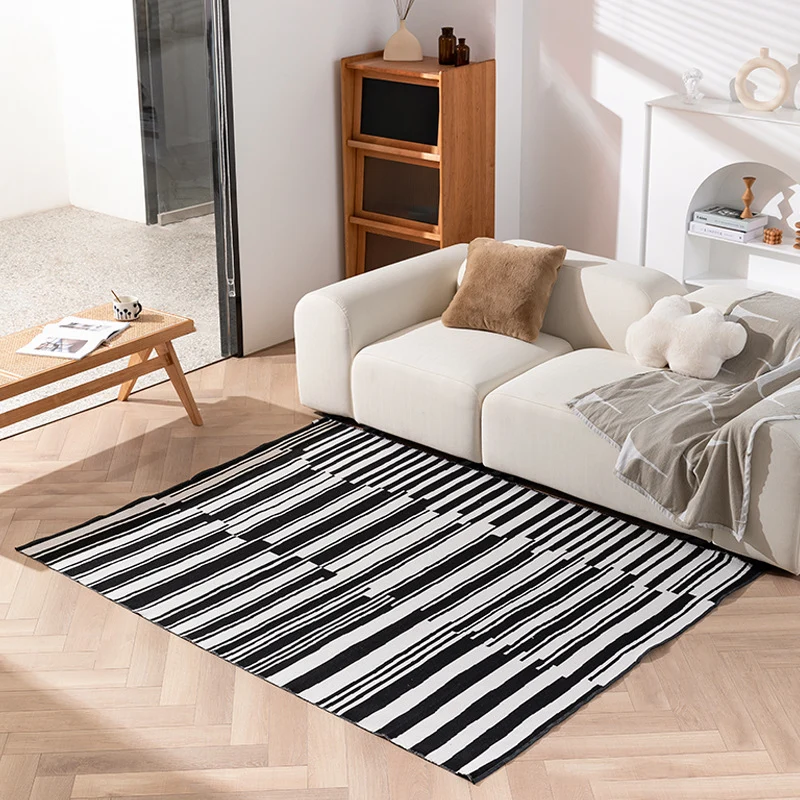 Modern flat-woven living room rug with abstract geometric design Stornfield