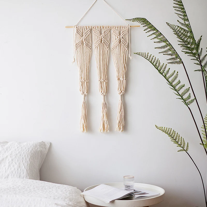 Macramé wall hanging with geometric triple tassel design and wooden rod Stornfield