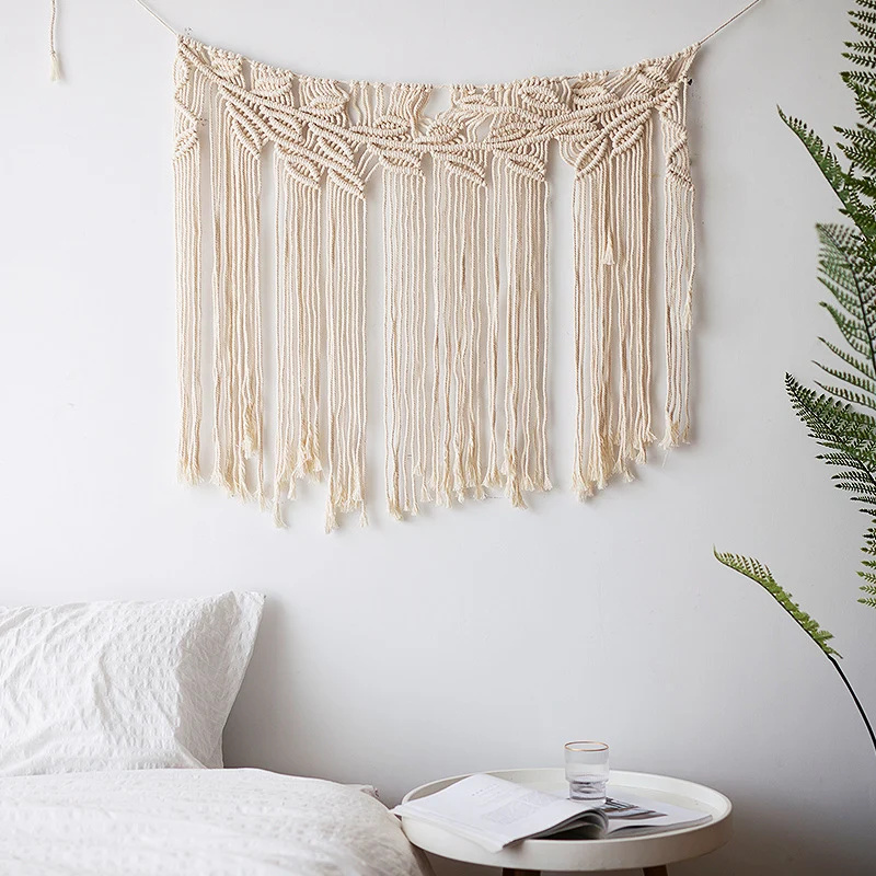 Macramé wall hanging with geometric triple tassel design and wooden rod Stornfield