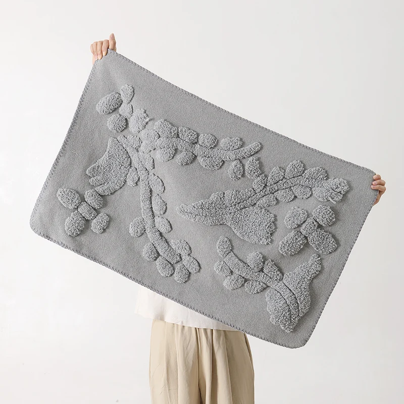 Luxurious organic cotton bath mat with relief pile structure Stornfield
