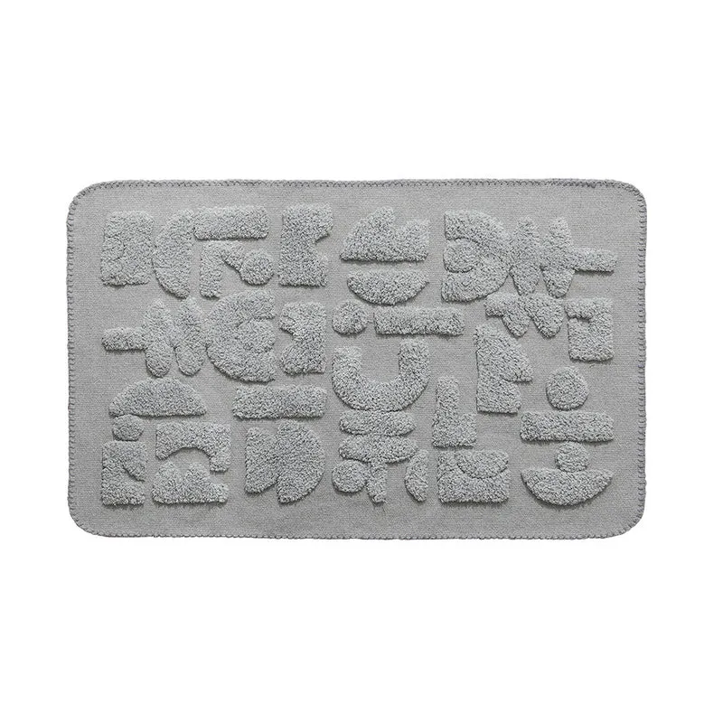 Luxurious organic cotton bath mat with relief pile structure Stornfield