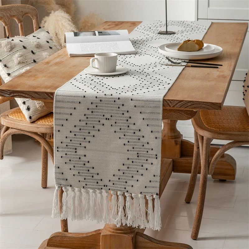 Handwoven table runner made of cotton blend with fringes and geometric dot jacquard Stornfield