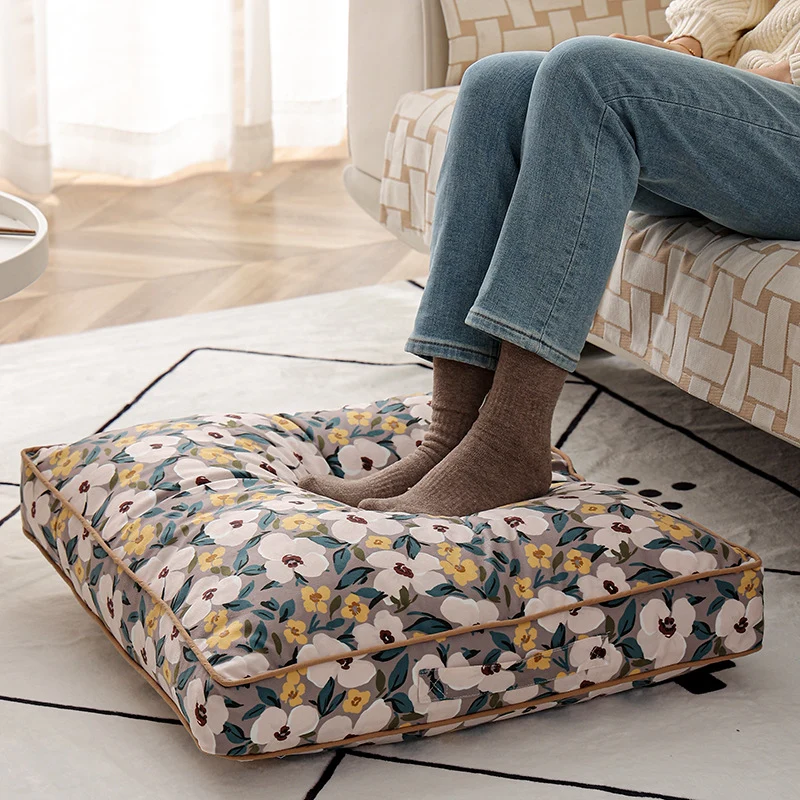 Large square floor cushion with floral cotton cover, piping, and carrying handle Stornfield