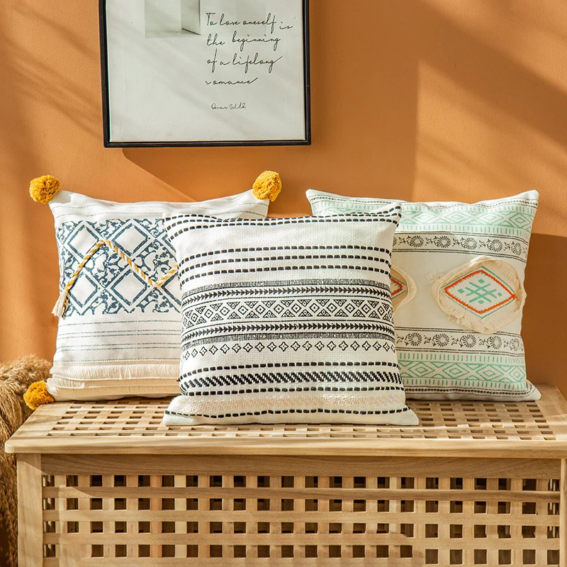 Woven decorative cushion cover in ethnic mix with braided ribbon and tassels Stornfield