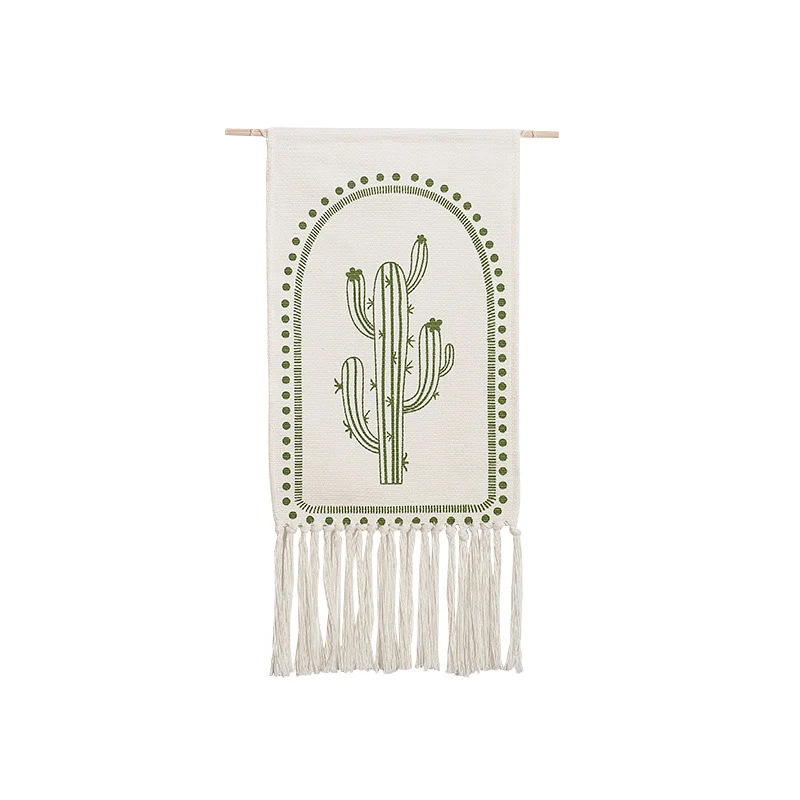 Woven wall hanging with hand-drawn mushroom motif and long cotton fringes Stornfield