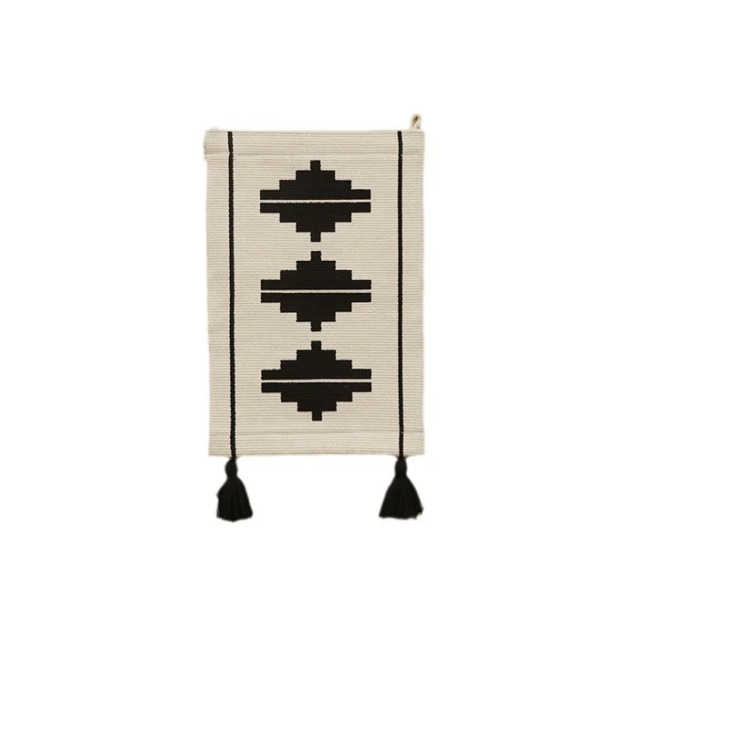 Woven wall hanging with graphic ethnic relief and tassels Stornfield