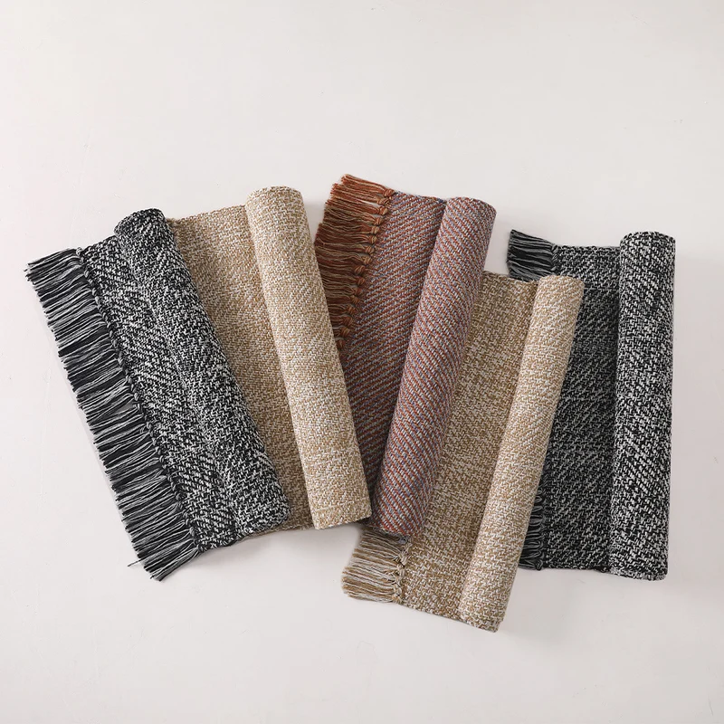 Woven table runner made of cotton blend with fine structure and herringbone look as well as decorative fringes Stornfield