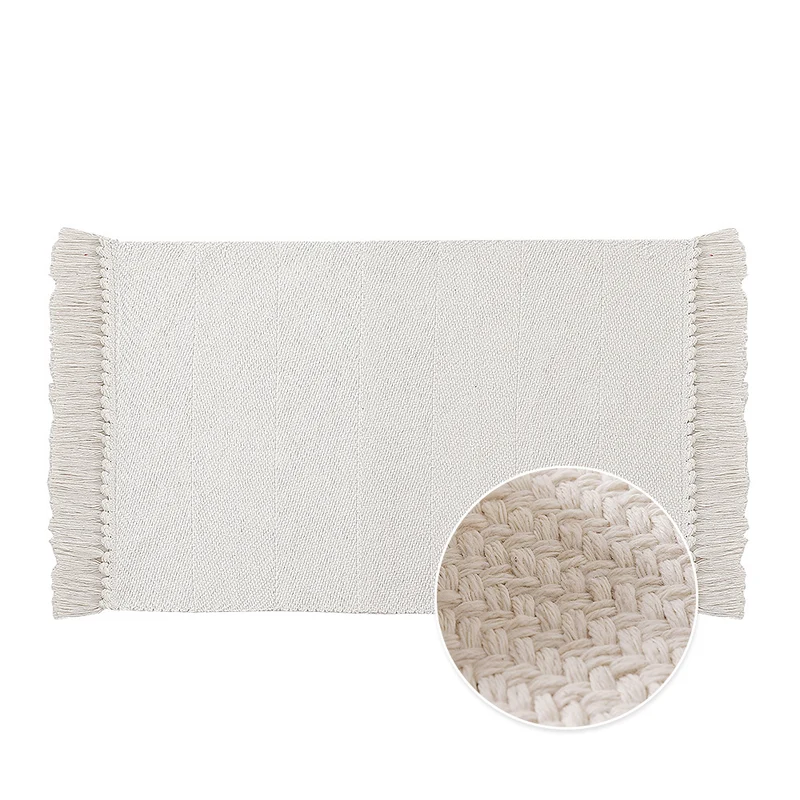Woven table runner made of cotton blend with fine structure and herringbone look as well as decorative fringes Stornfield