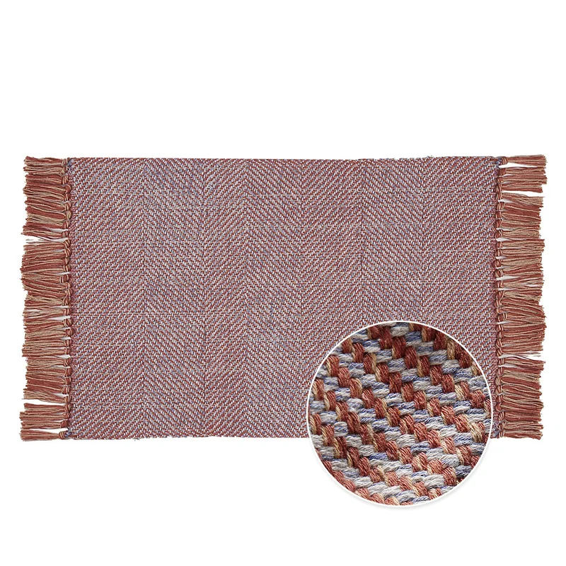 Woven table runner made of cotton blend with fine structure and herringbone look as well as decorative fringes Stornfield