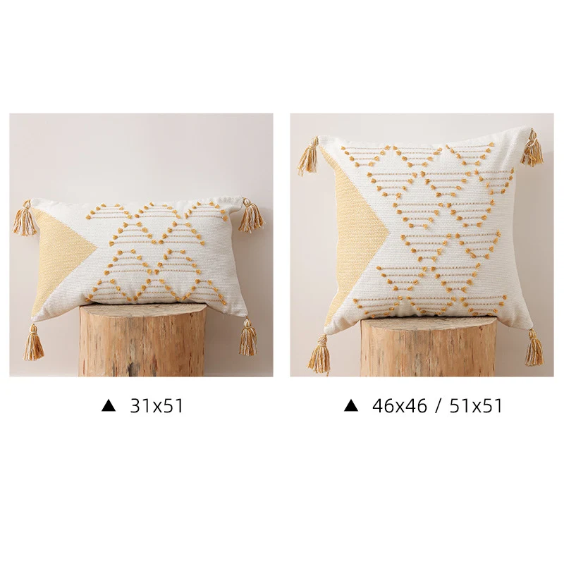Decorative woven cushion cover with geometric tuft-relief and tassels Stornfield